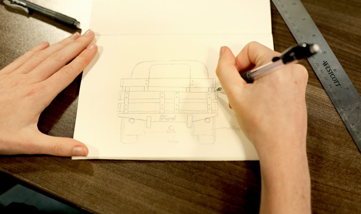Shannon sketches a truck